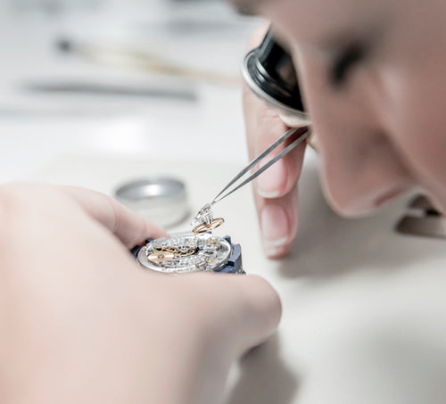 Rolex Watchmaker Assembling a Watch