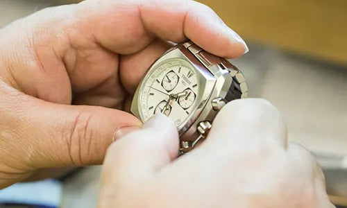 Watch in man's hand