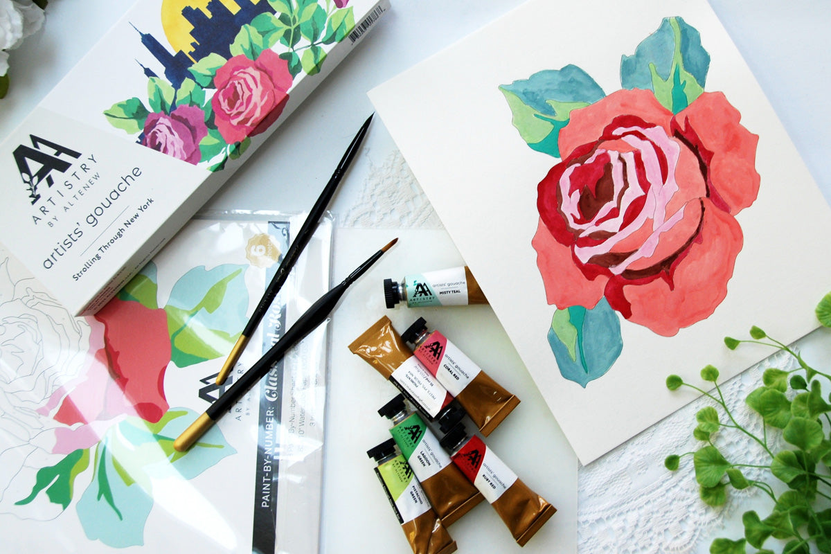 A coloring sheet from Artistry's Paint by Number kit depicting a huge image of a rose and Artistry's gouache paints