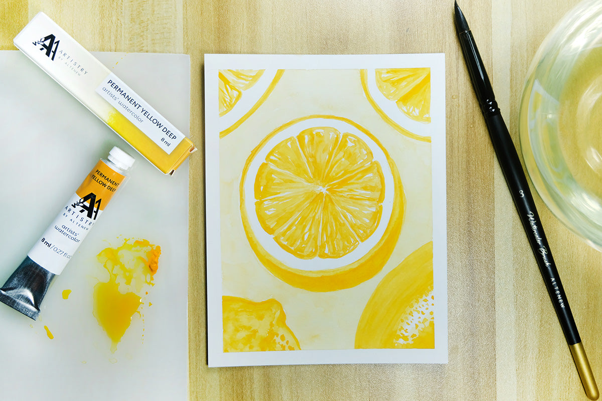 Watercolor painting of cut lemons, made with Artistry watercolor tubes