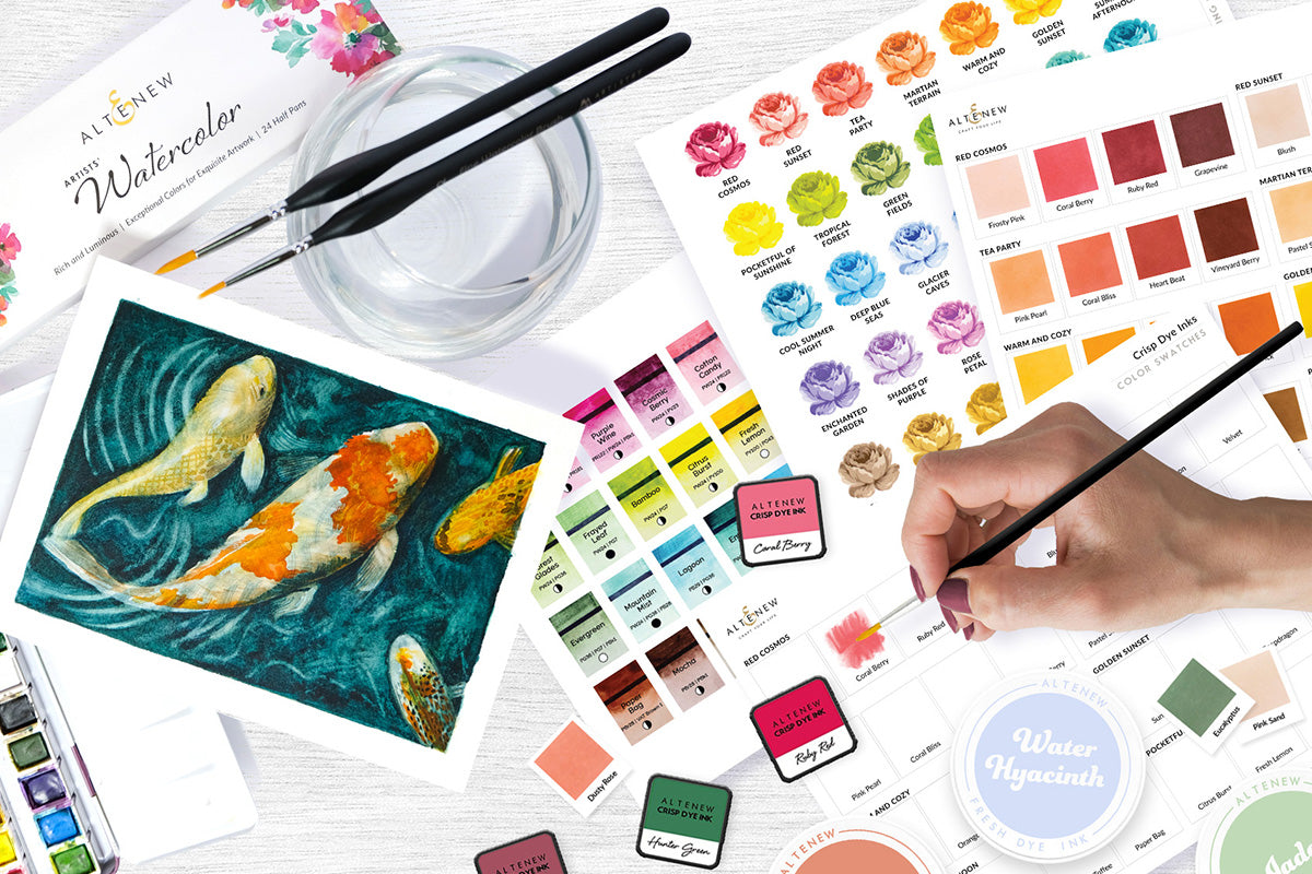Flat lay photography of a watercolor painting of koi fish, watercolor supplies and tools, Fresh Dye Inks, and ink color swatches