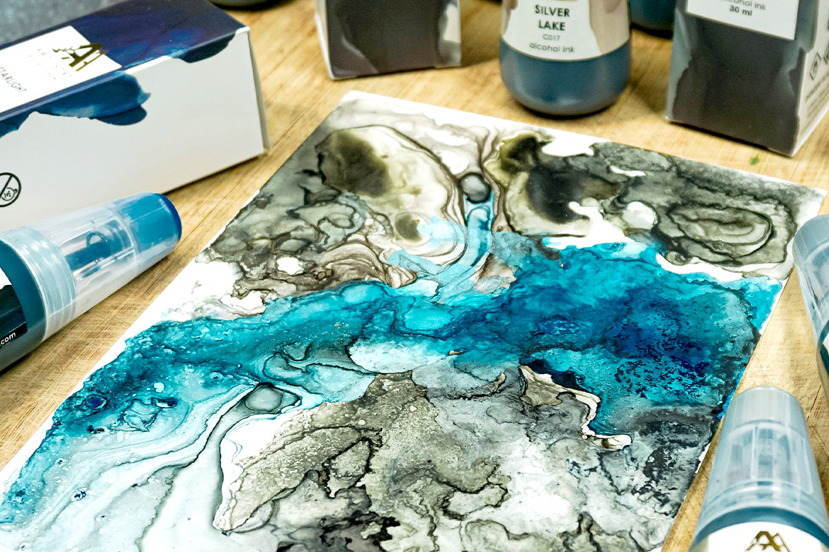 A beautiful alcohol ink art made with Artistry by Altenew alcohol inks