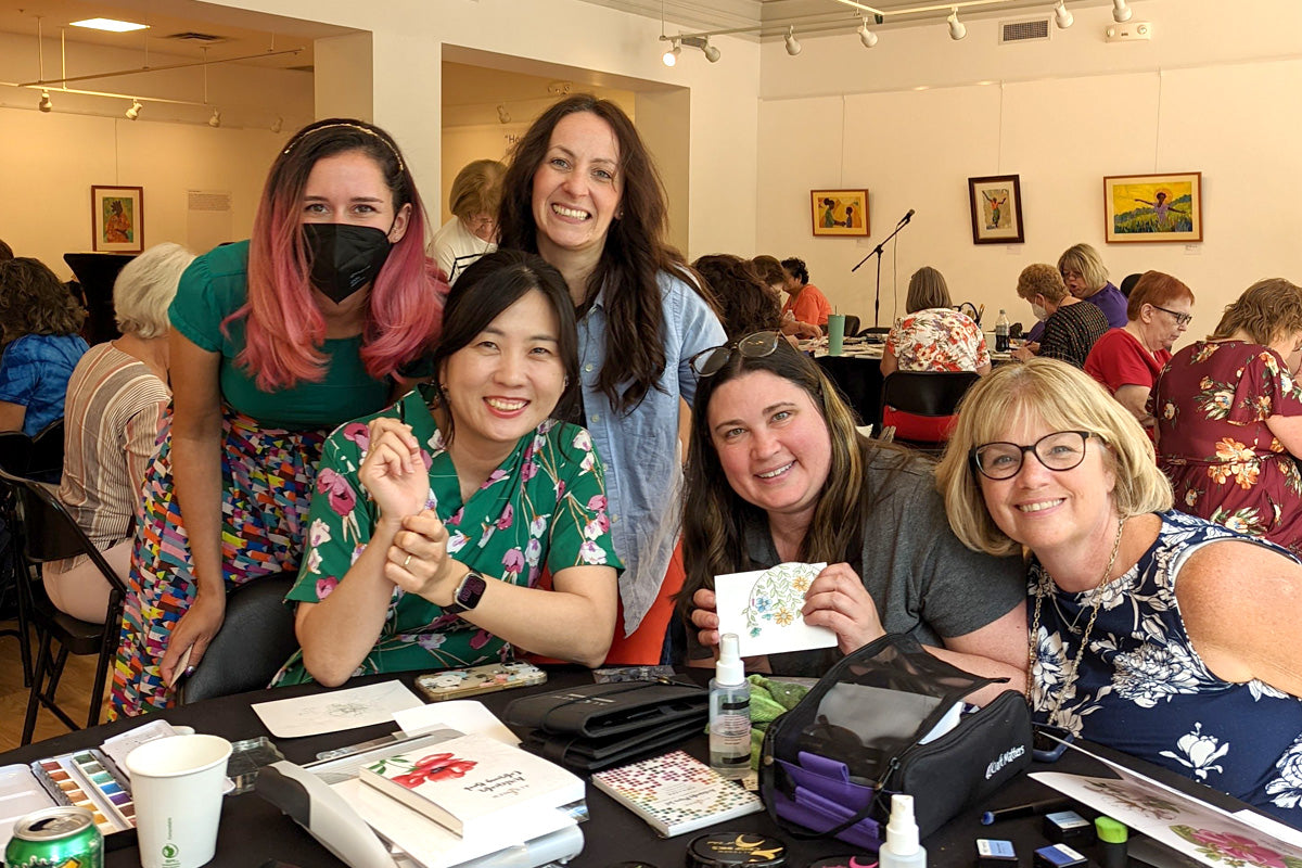 Crafters meeting together for a fun crafting workshop