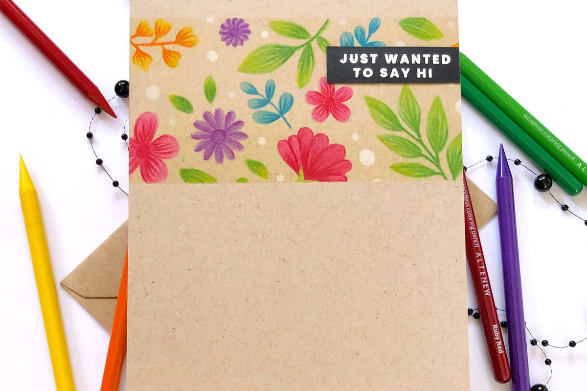 Beautiful stamped florals and foliage on Kraft cardstock colored with coloring pencils