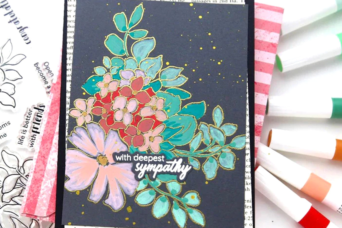 A sympathy card with a floral focal point on dark background, created and colored in with the 24-Color Acrylic Marker Set