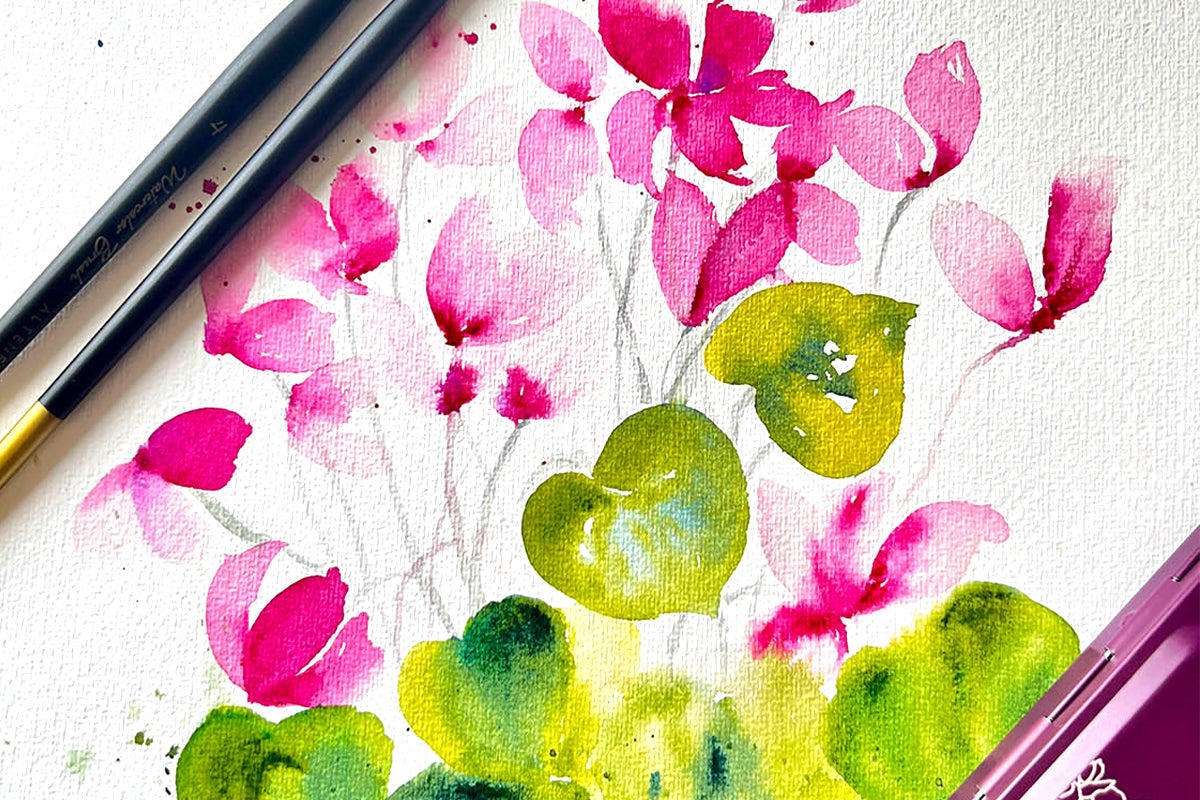 A close-up of freehand watercolor floral art, made with Artistry by Altenew's Artists' Watercolor 24 Pan Set
