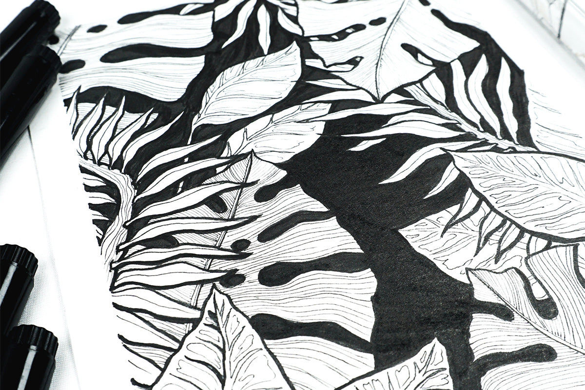 Black and white drawing of monstera leaves, made with Artistry's Fine Liner Pens