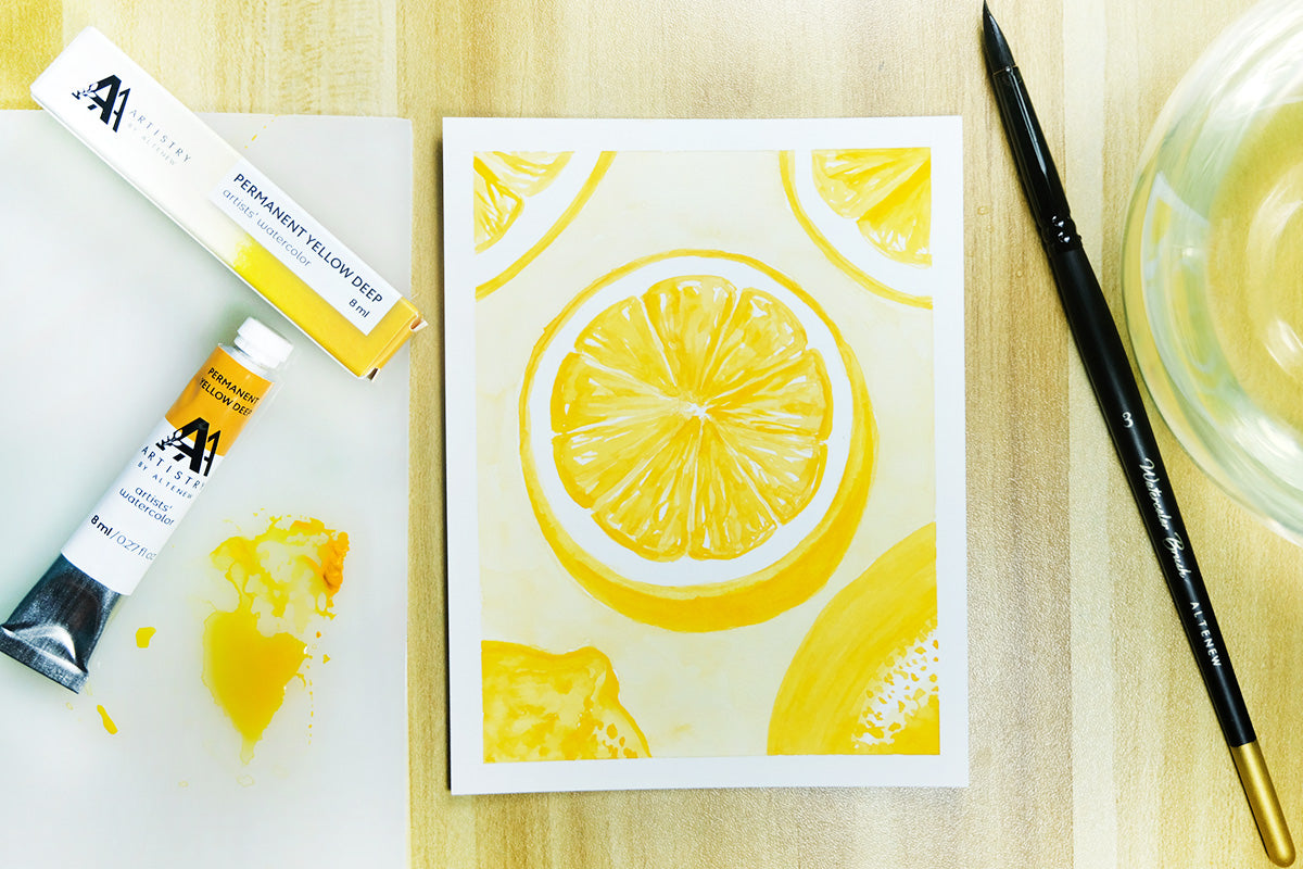 A watercolor painting of cut and uncut lemons, painted using Artistry by Altenew's watercolor tubes