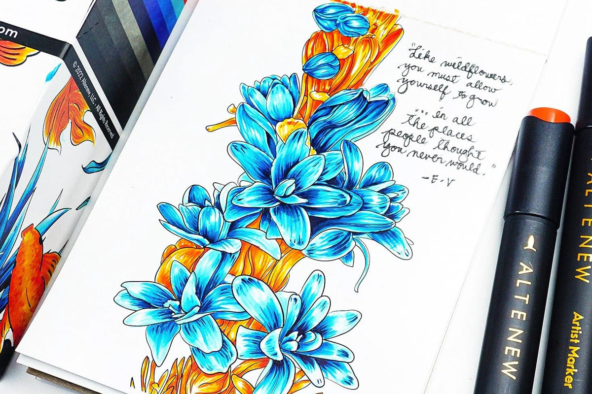 A drawing of a blue and orange flower with a handwritten note on the right-hand corner