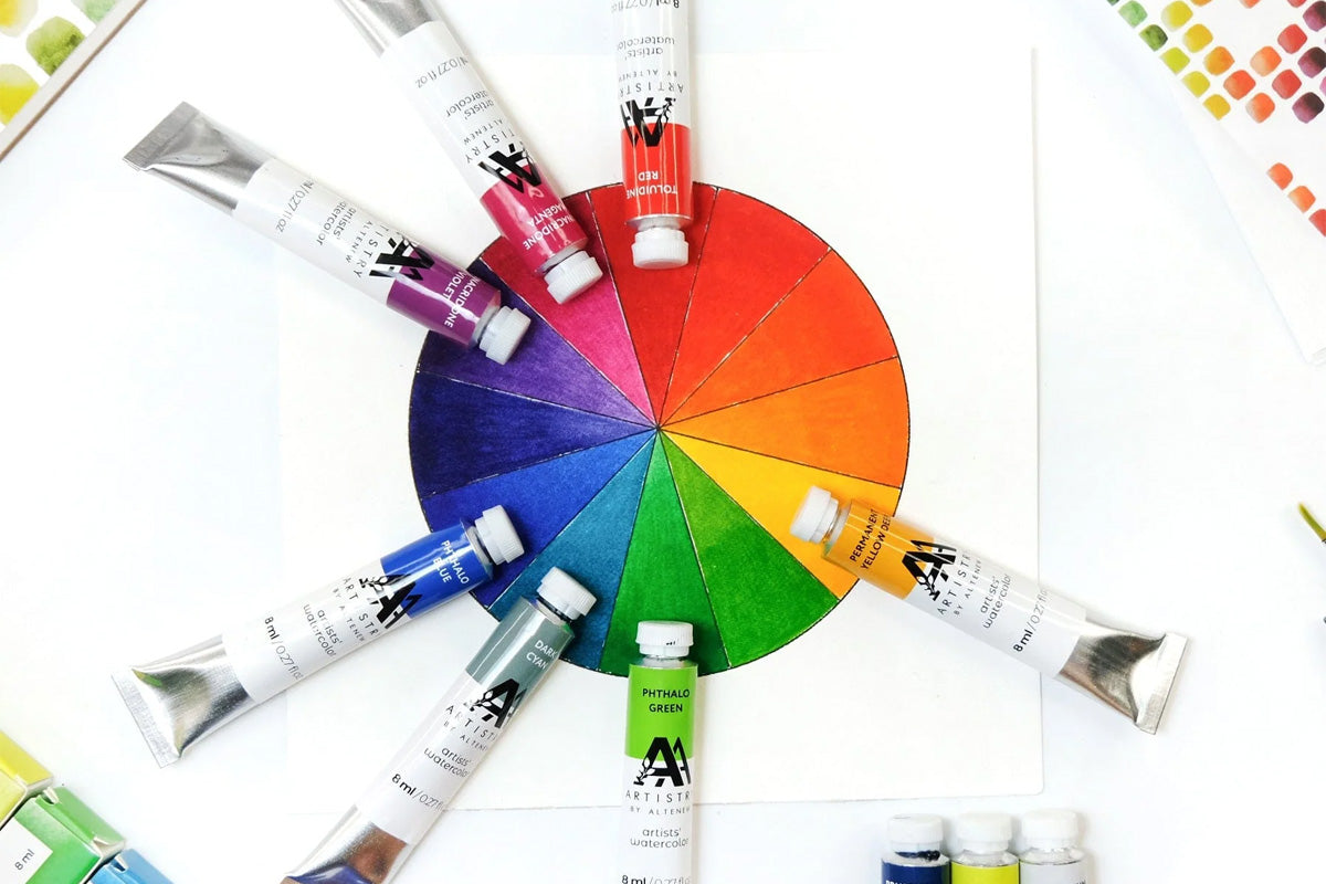 A color wheel made from shades of watercolor tubes