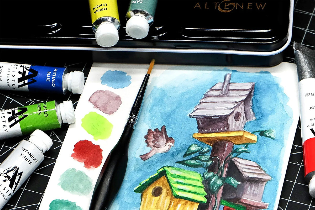 A watercolor painting of birdhouses, painted using Artistry's high quality watercolor tubes set
