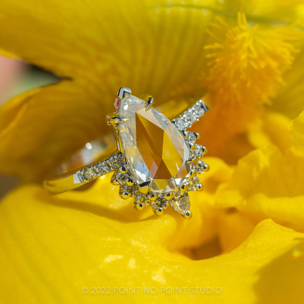 Translucent pear diamond engagement ring
