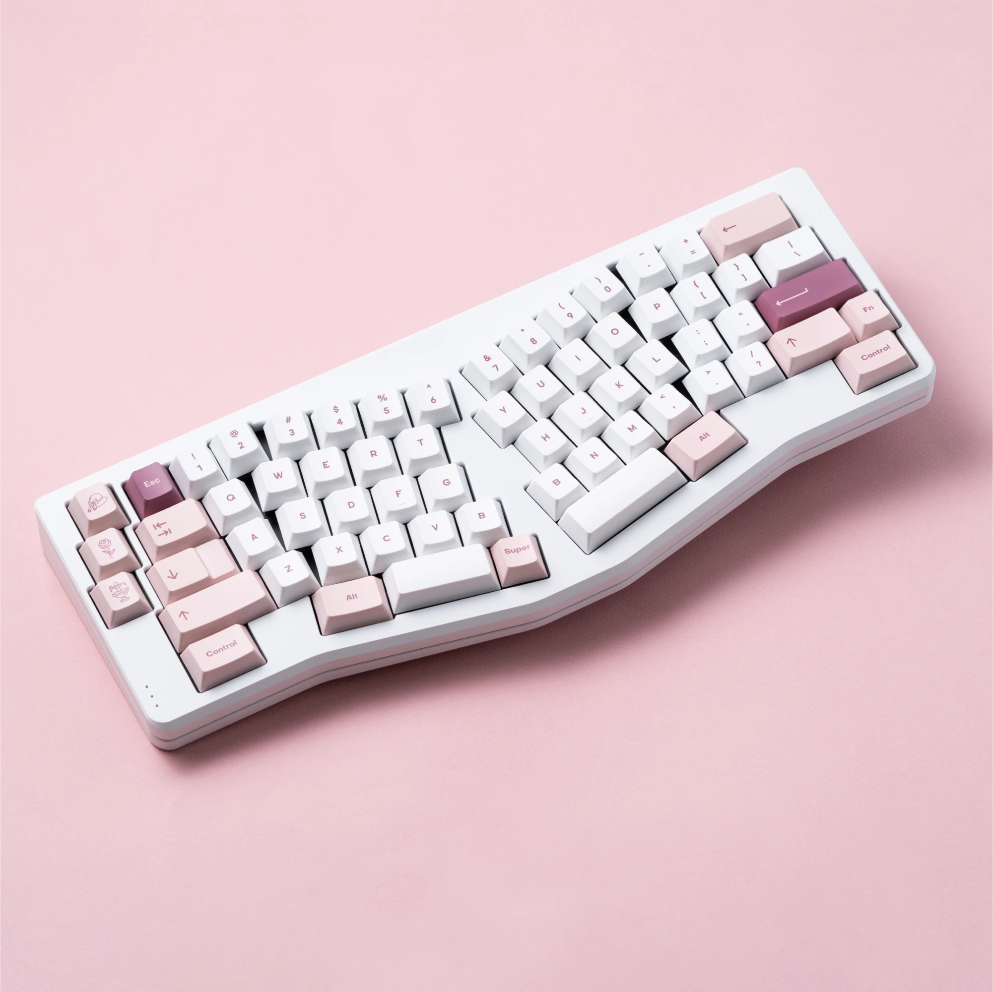 A photo of Rosewater on a white Alice-style keyboard.