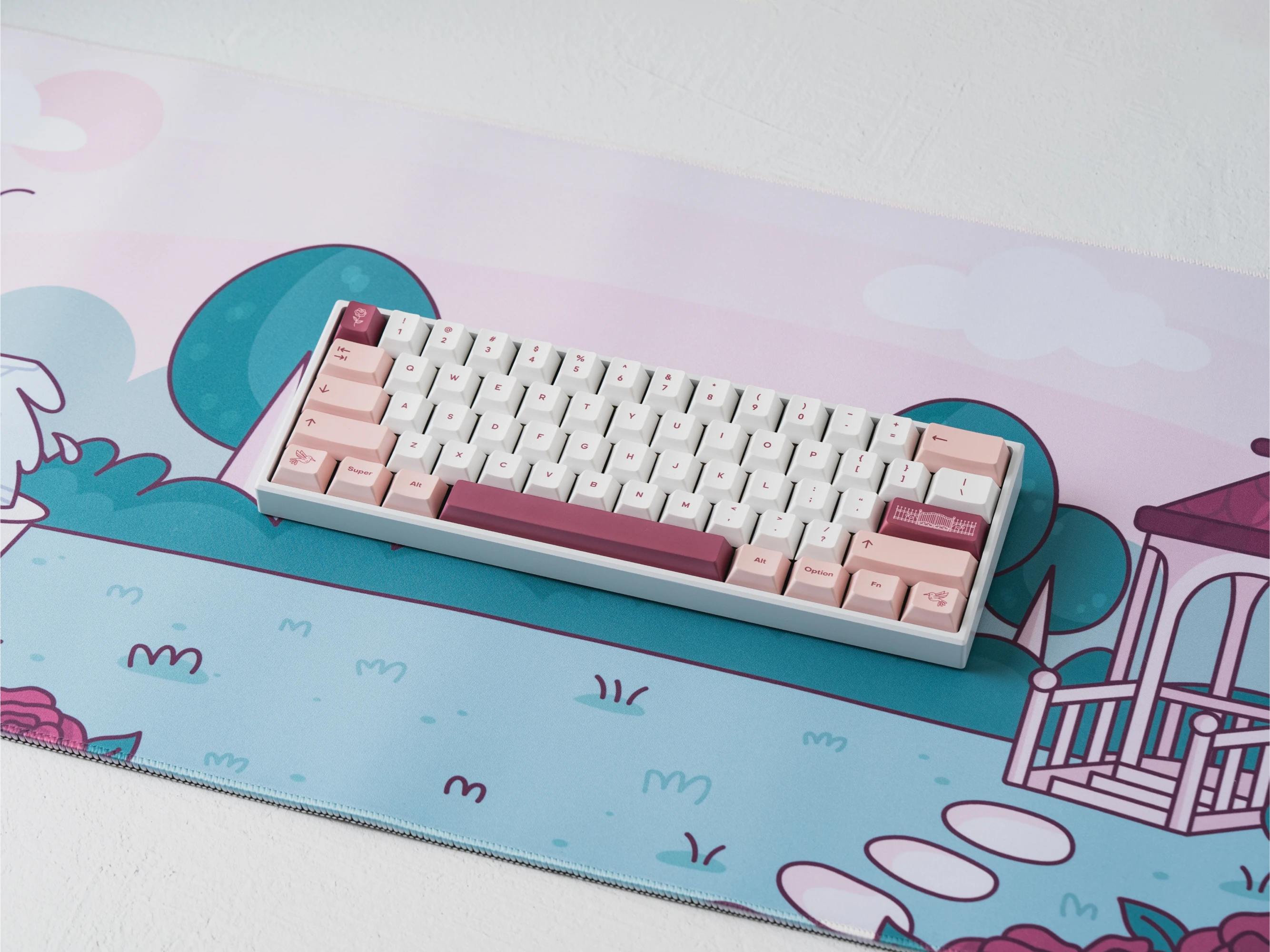 A photo of Rosewater on a white 60% keyboard on the Rosewater deskmat.