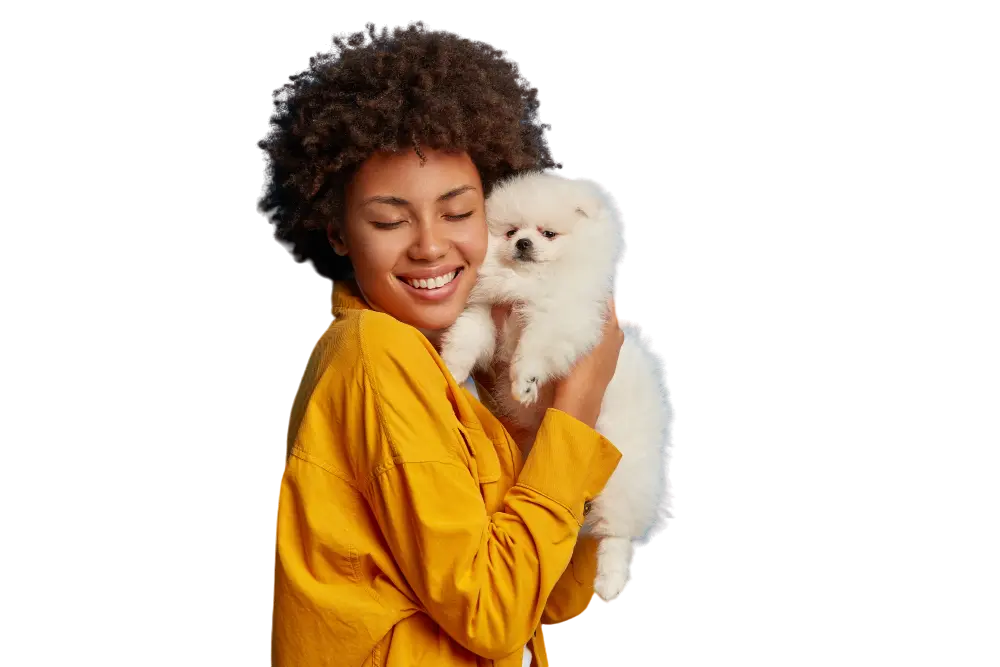 studio-shot-glad-female-model-holds-fluffy-pet-closely-face-after-grooming-smiles-with-happiness-PhotoRoom