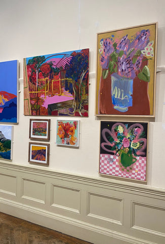 gallery with paintings of abstract flowers