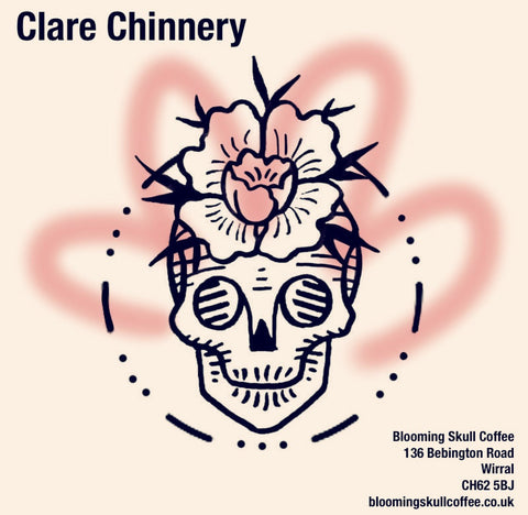 coffee shop logo showing a skull and flowers and advertising the paintings of clare chinnery