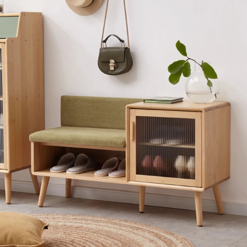 An Entryway Bench With Upholstered Cushion