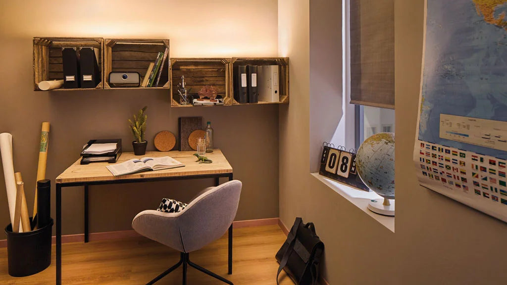 Office storage units mounted on wall in a home office.