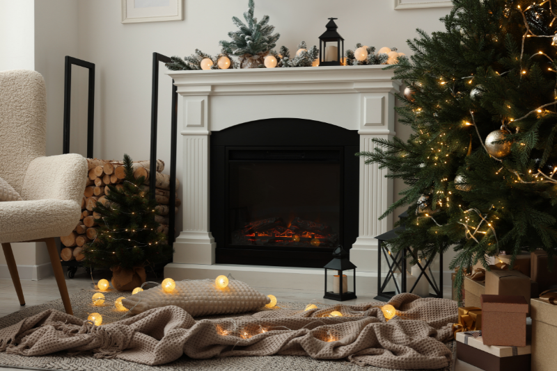 a fireplace with winter decor