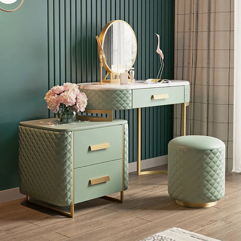 an elegant green table with mirror