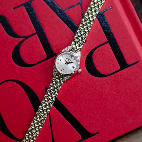 Rotary Cocktail Watch on a book