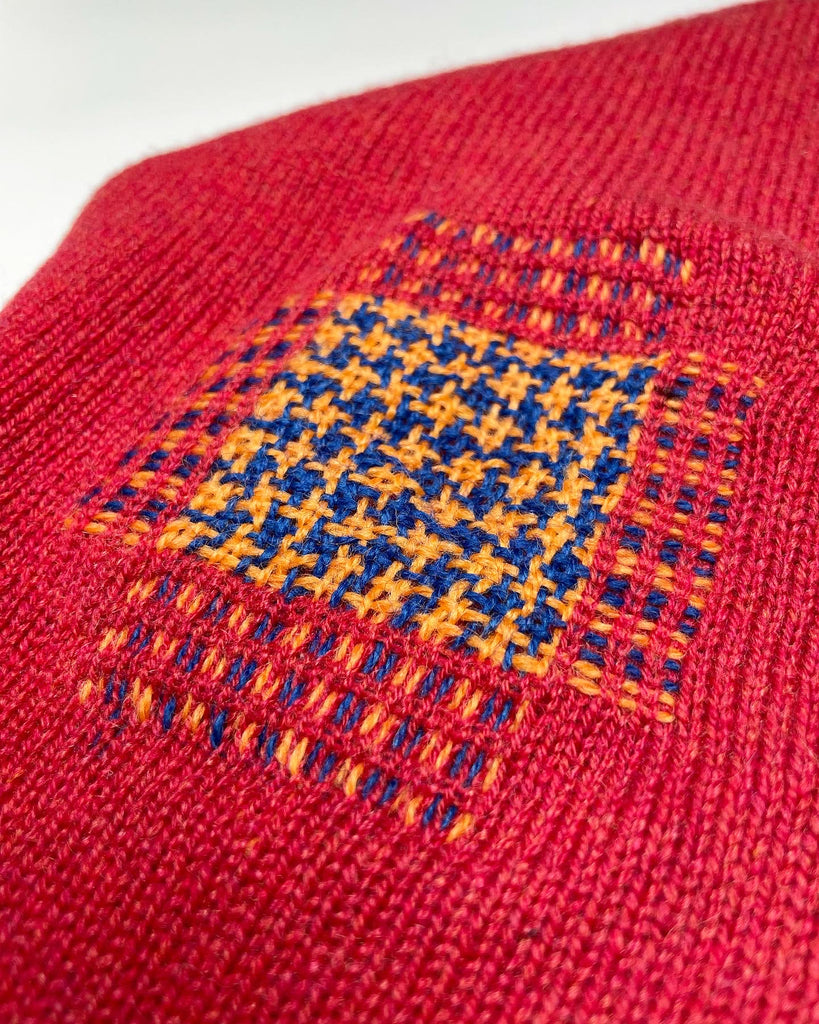 houndstooth darn on a jumper elbow visible mending by slow stitch club