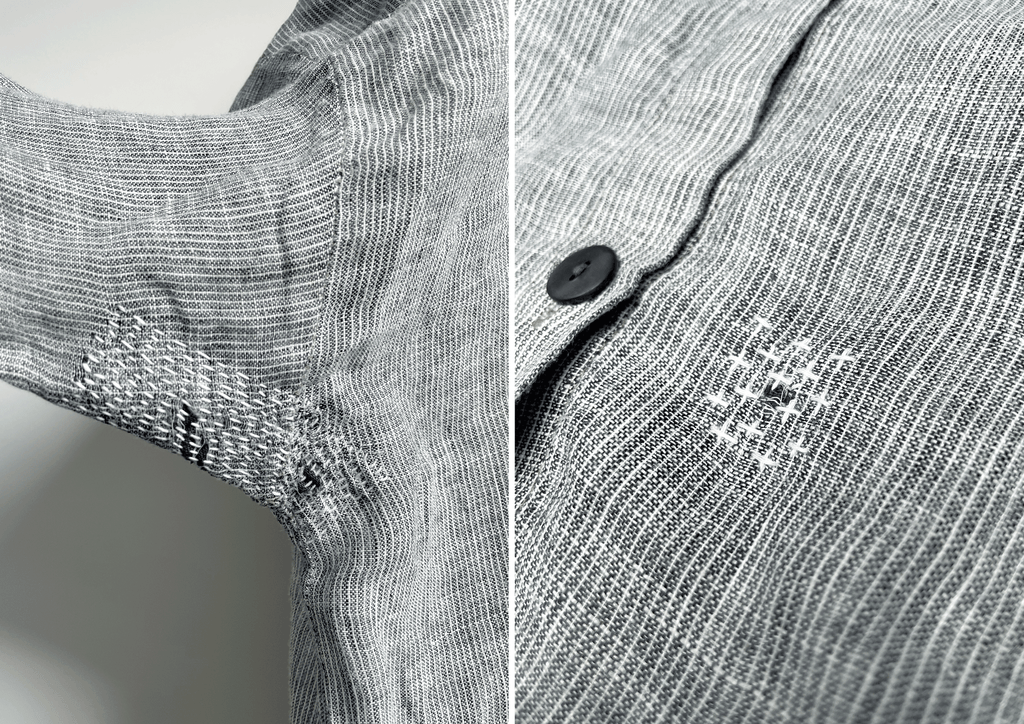 sashiko patch repairs on a shirt by slow stitch club