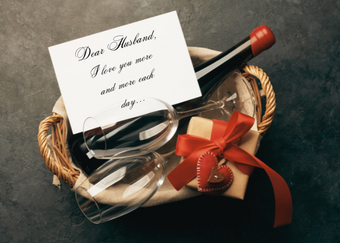 wine bottle in a basket with valentines love note to husband