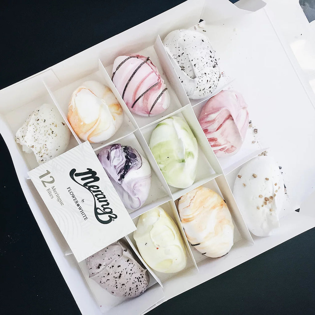 box of meringues in pastel colours