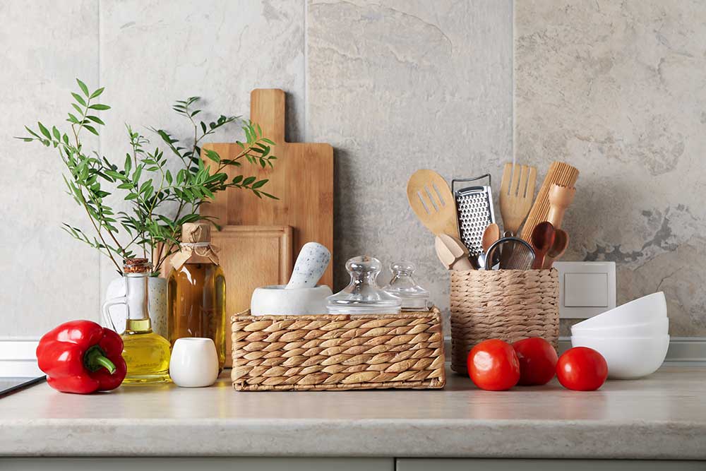 Kitchen table with different supplies and vase