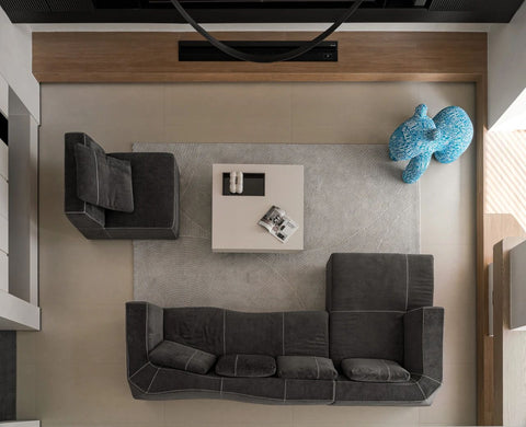 minimalist grey fabric sofa and coffee table