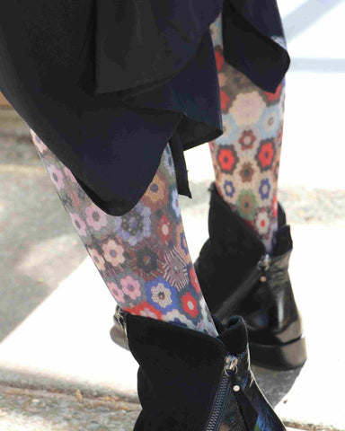 Patterned tights with dress.