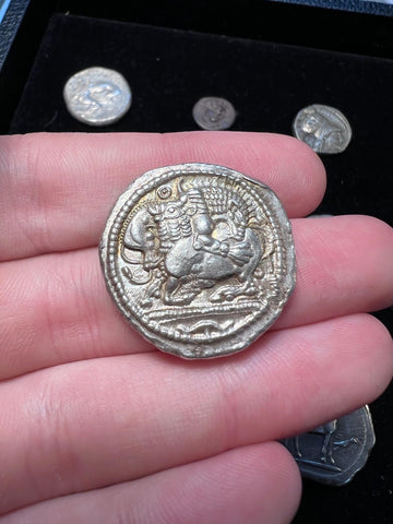 Dionysos on horseback ancient coin