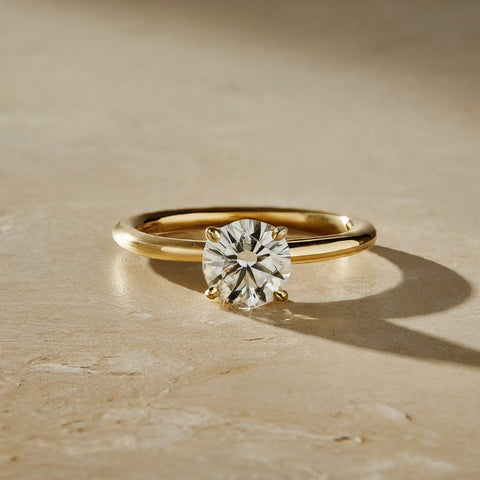 4 prong solitaire engagement ring in yellow gold