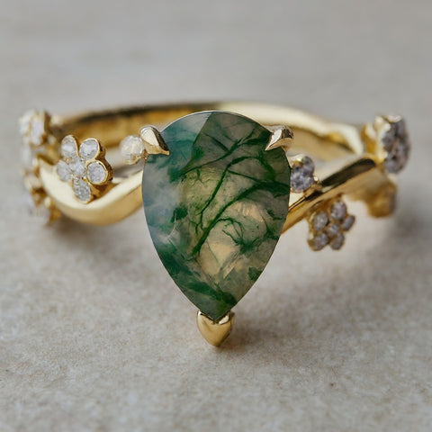 whimsical moss agate engagement ring in yellow gold