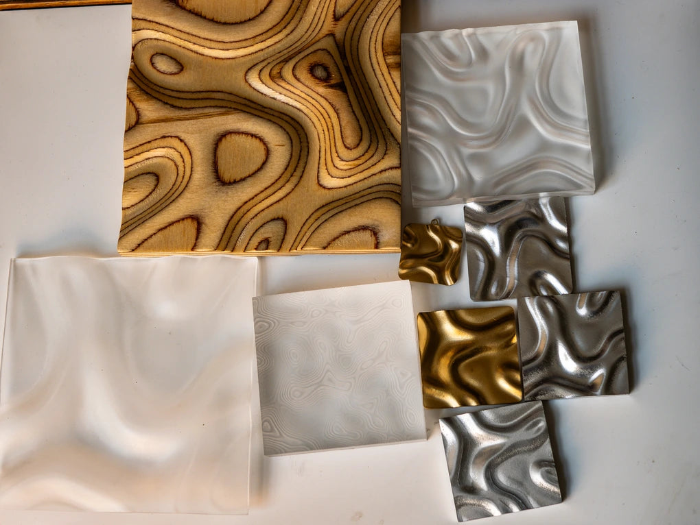 3D wave relief carvings in aluminum and brass