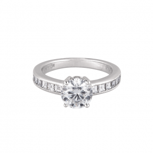 Side stone engagement ring
