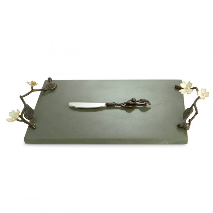 metal tray with flowers and a cheese knife