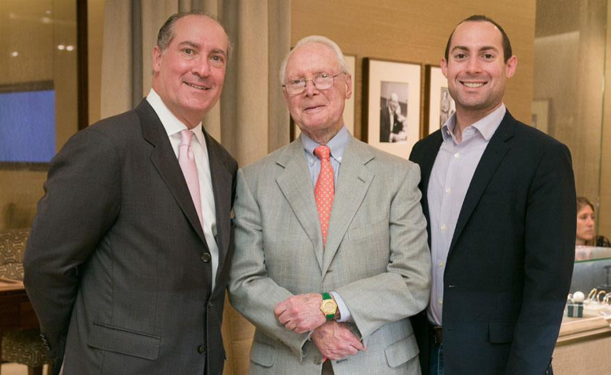 Hank, Martin, and Andrew Siegel at an event