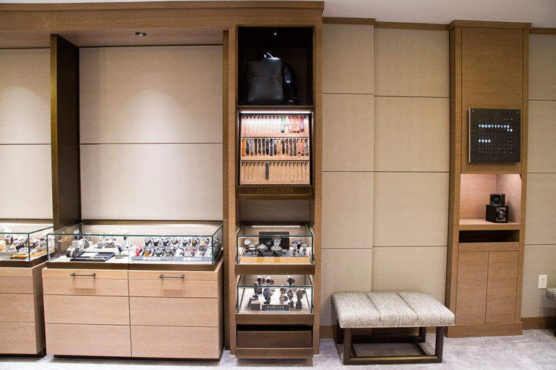 A showcase wall for luxury watches and accessories in the Watch Salon.