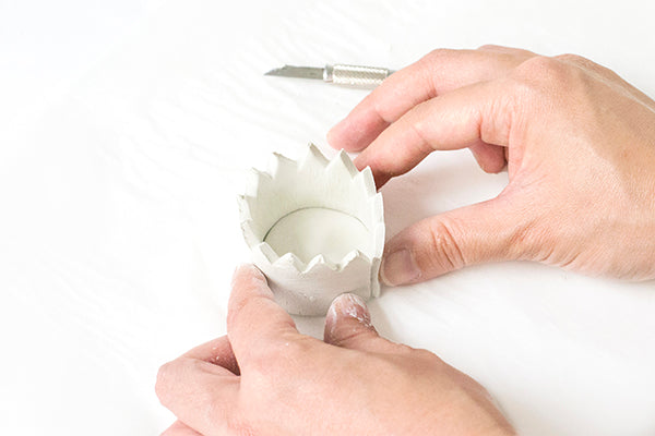 Whip up these easy DIY clay crown egg cups to give to friends for Easter!