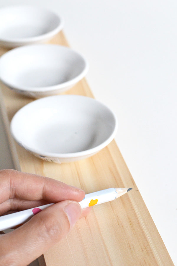 gold leaf trinket dishes and wood base