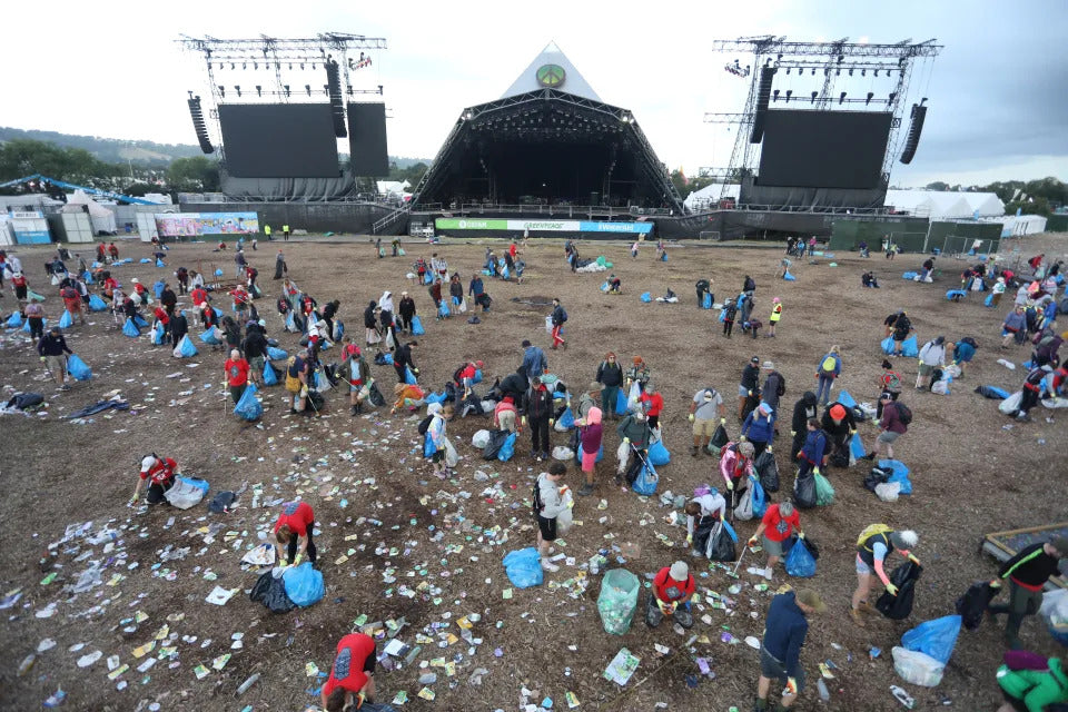 Volunteers Picking Up Trash & Waste After Music Festival