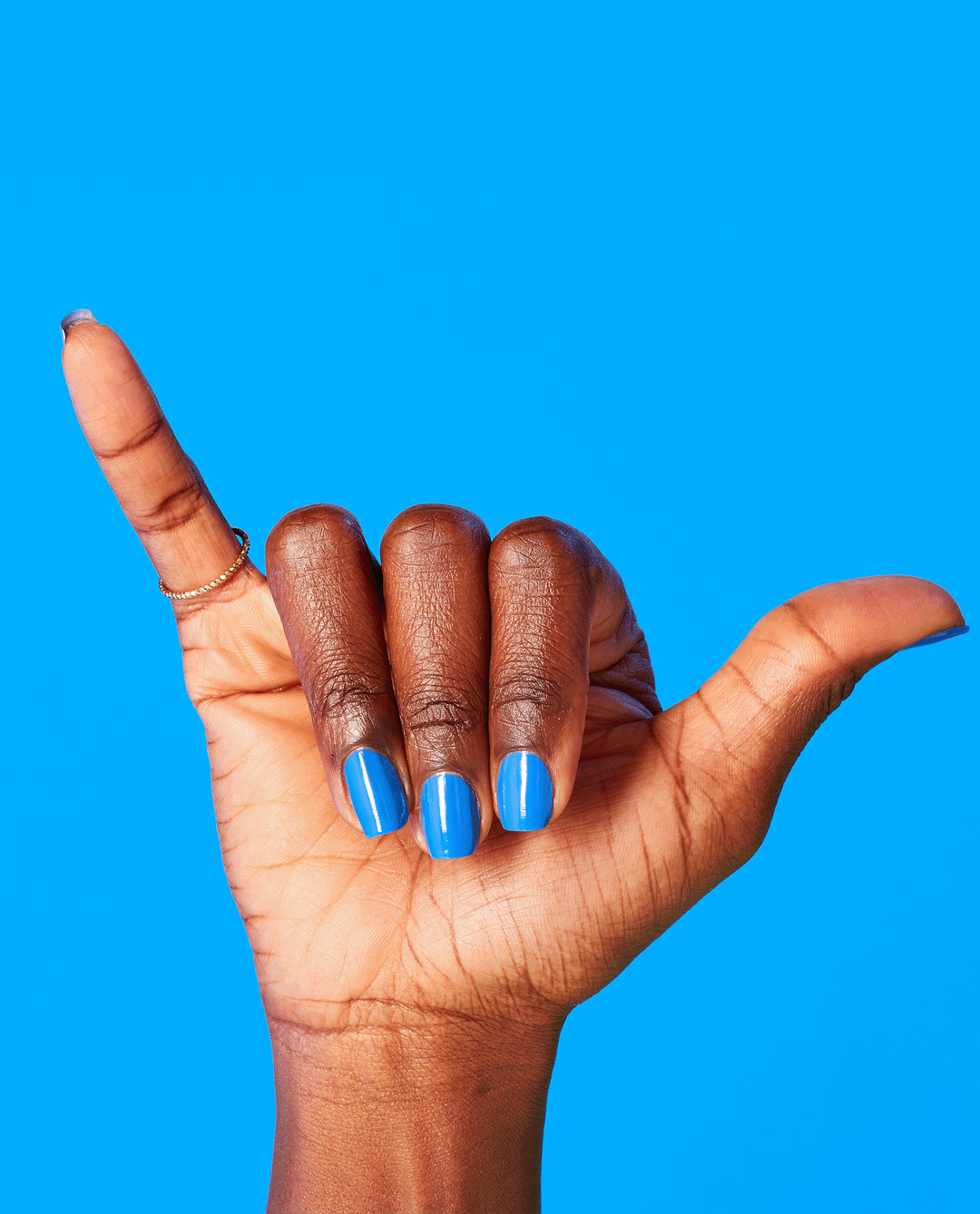 OPI Tile Art to Warm Your Heart Blue Nail Polish GIF
