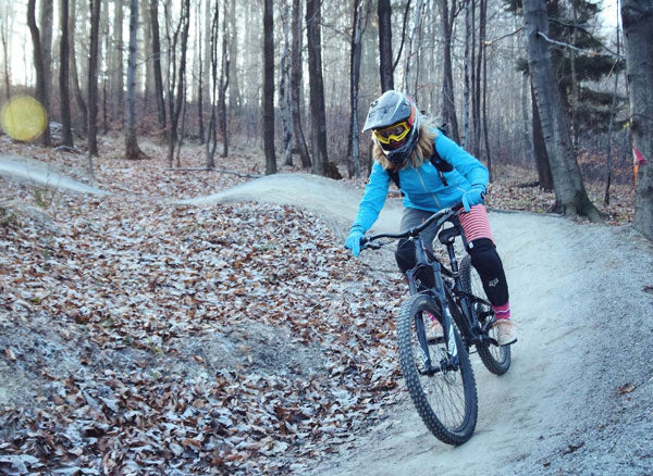 women cycling ride in the mountain