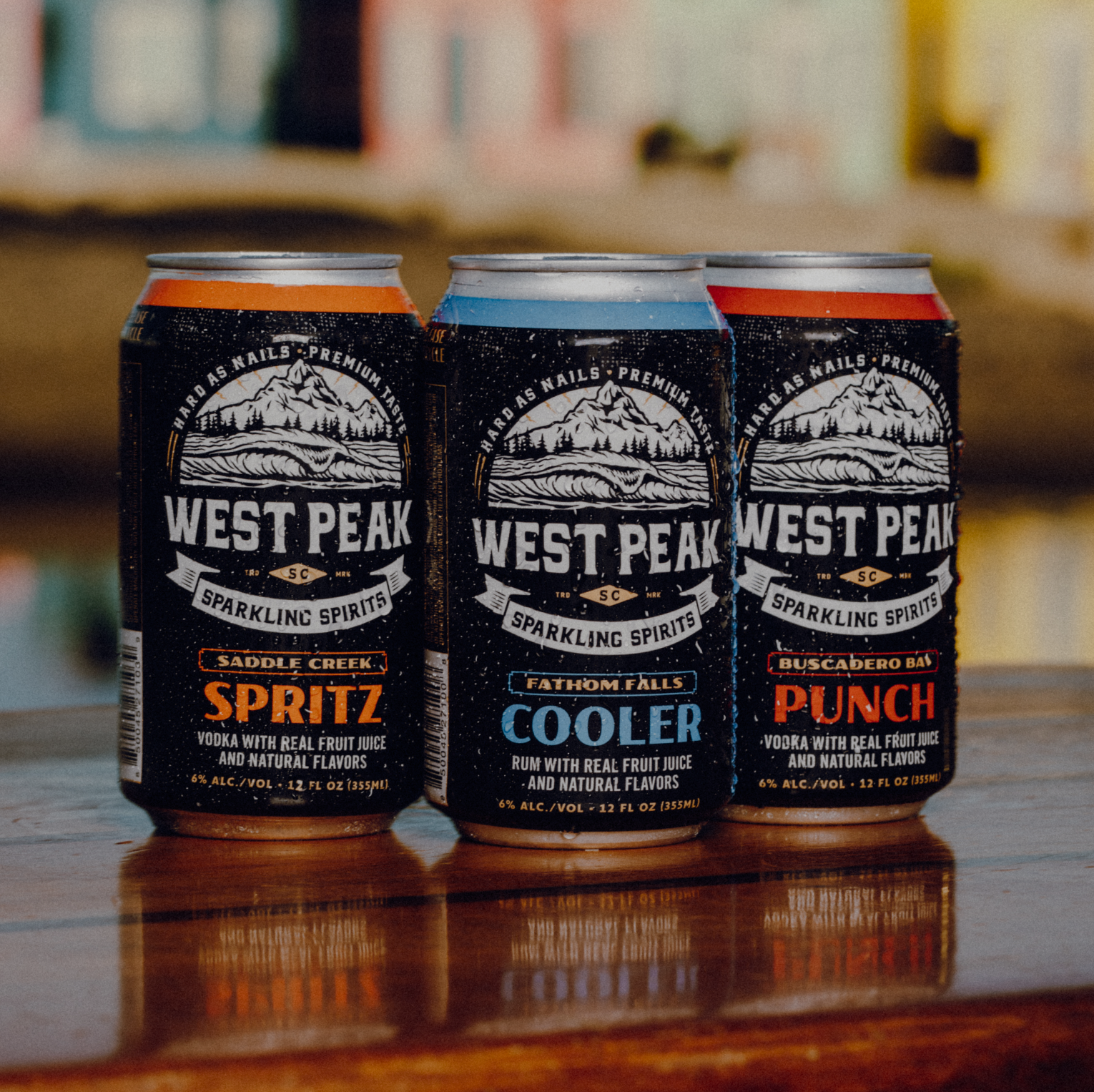 Photo of three West Peak cans