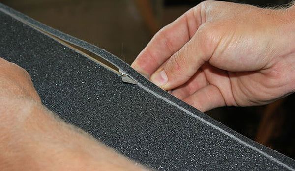 Fitting skateboard griptape