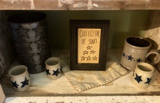 shelf with star-themed decorations
