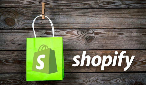 Shopify logo with a shopping bag
